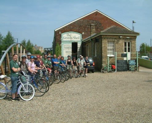 summer cyclists in front of Goods Shed , Canterbury