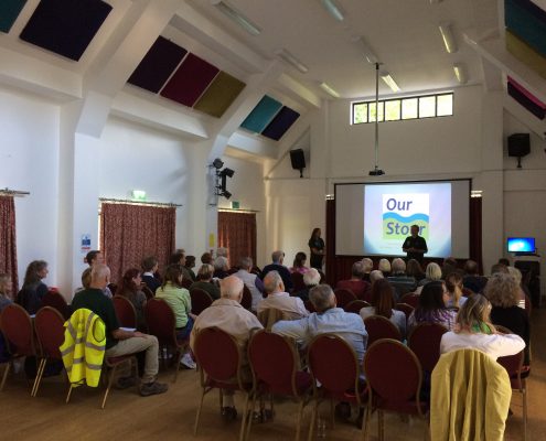 speaker with presentation at Our Stour opening event