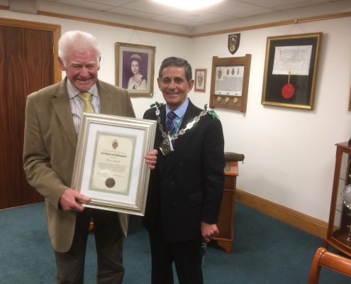 Mr Brian Sandall reveing certificate from Mayor Ashford
