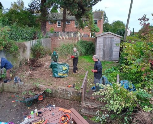 volunteers doing garden work